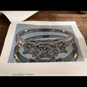 White gold engagement ring, with new appraisal. Appraised at 10,600.